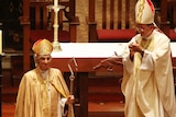 Perth Archdeacon Kay Goldsworthy, left, is consecrated at St George's Cathedral