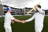 Australian skipper Steve Smith (L) greets Proteas captain Faf du Plessis after the second Test.