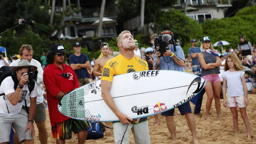 Mick Fanning looks to the sky ahead of his 2015 Pipe Masters quarter-final.