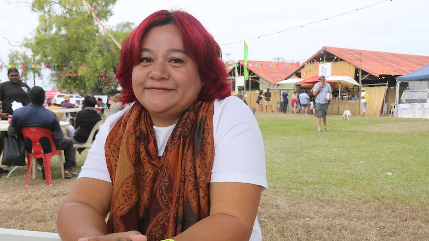 Sang Mei-Chaun sits at a table at Barunga