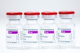 Four vials of AstraZeneca vaccine against COVID-19 are displayed at the newly opened Italian Red Cross Vaccination hub.