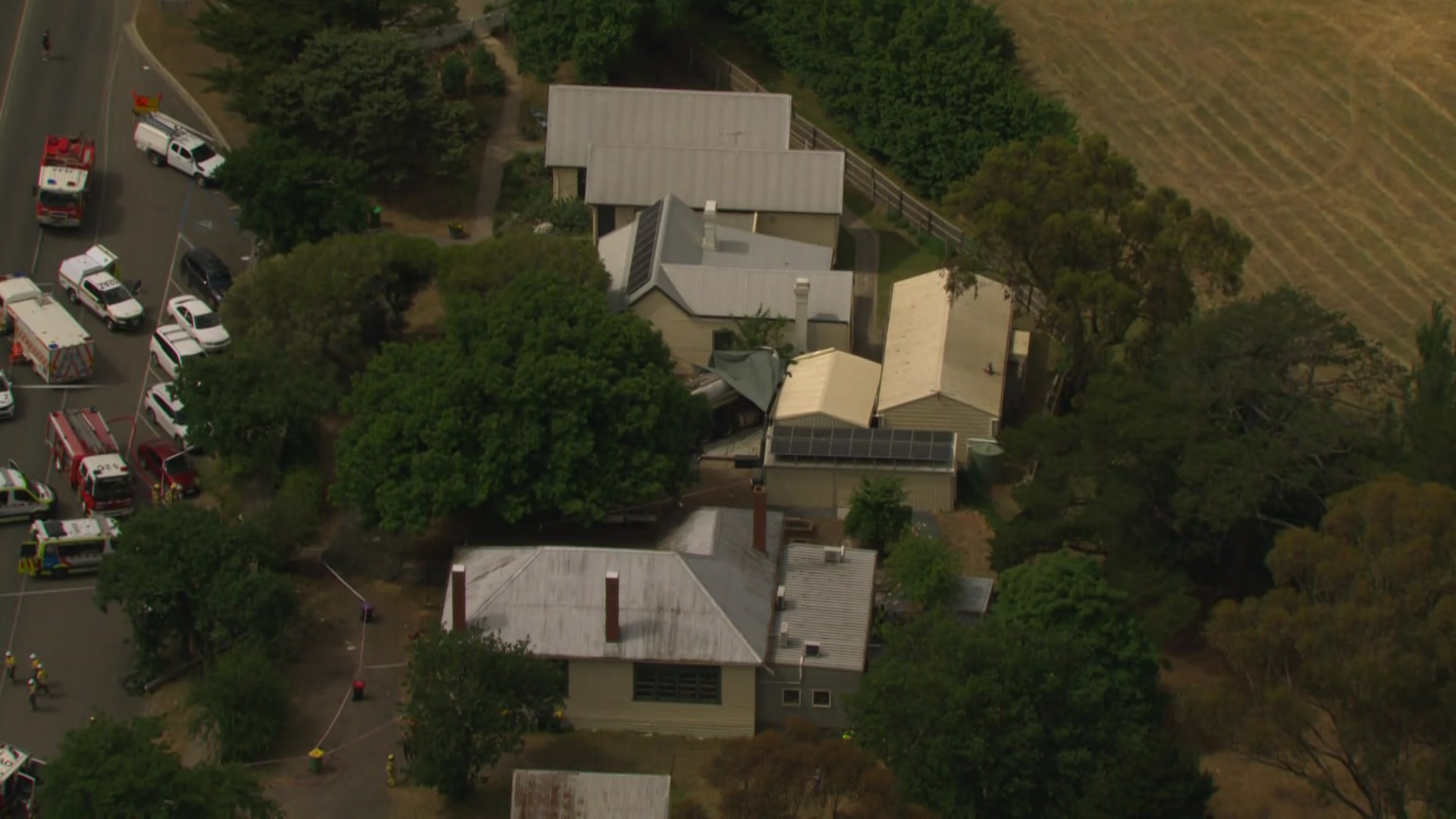 An aerial view of the kindergarten with emergency services present.