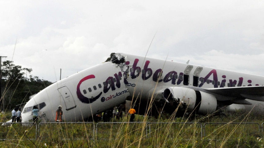 A crashed Caribbean Airlines jet at Cheddi Jagan International airport