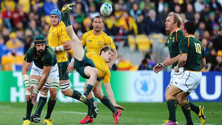 James O'Connor in mid air after contesting high ball v South Africa WC semi final