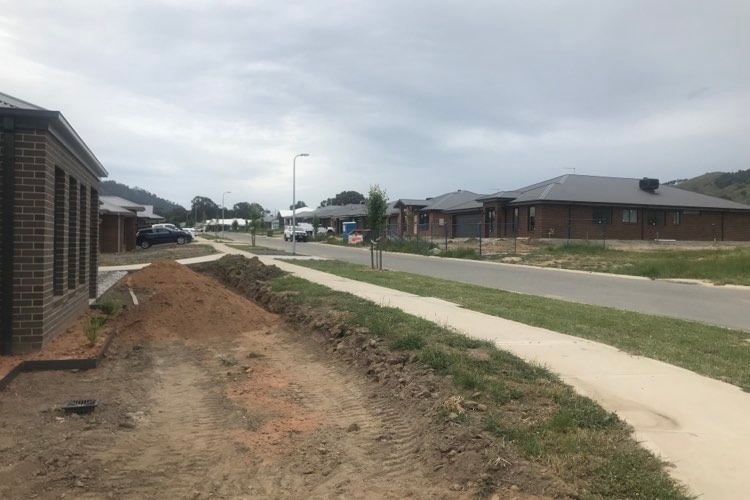 A street with new houses that have just been built.