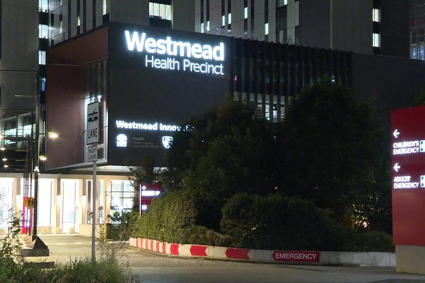 Westmead Hospital exterior at night.