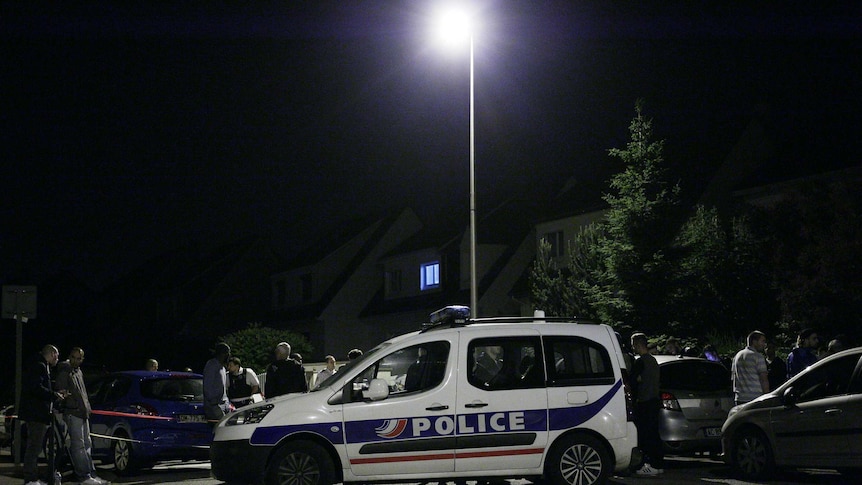 Police car blocking the road.