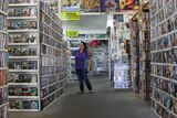 Thousands of DVD's stacked along walls of Wingham Movieland.
