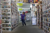 Thousands of DVD's stacked along walls of Wingham Movieland.