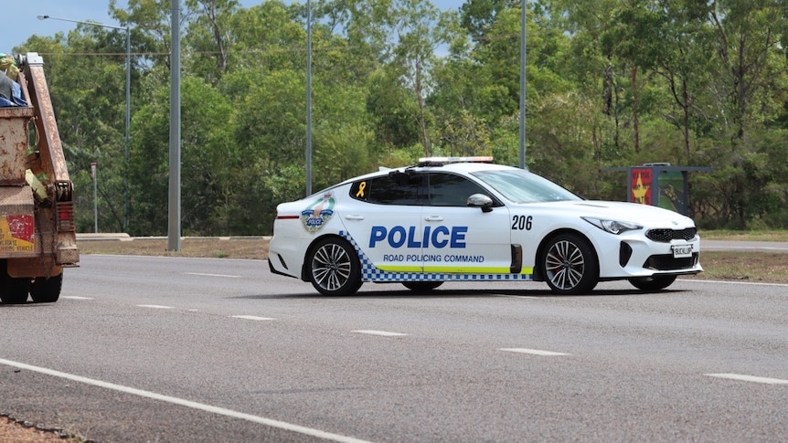 a police car in a rural area