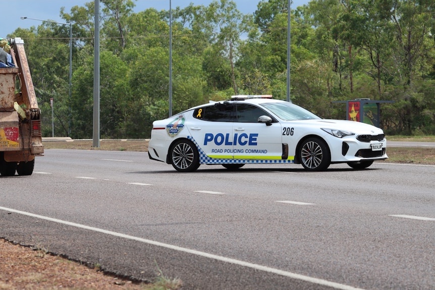 a police car in a rural area