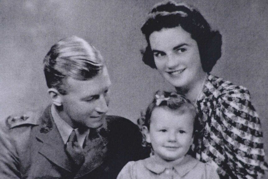 Black and white photo of Gert and Ronald White and their daughter