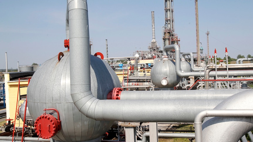 A network of metal pipes and bulbous metal spheres.