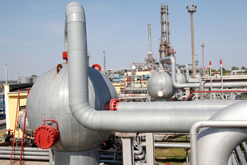 A network of metal pipes and bulbous metal spheres.