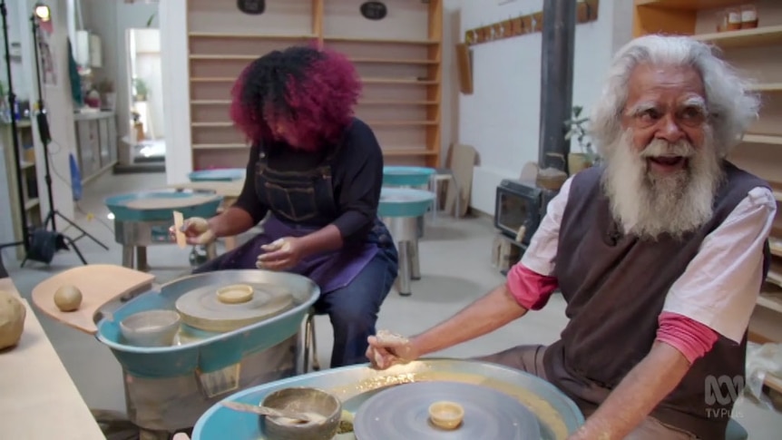 Uncle Jack Charles sits at pottery wheel