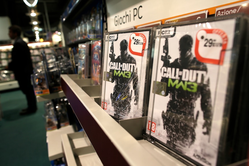 Close-up of copies of Call of Duty on shop shelves. 