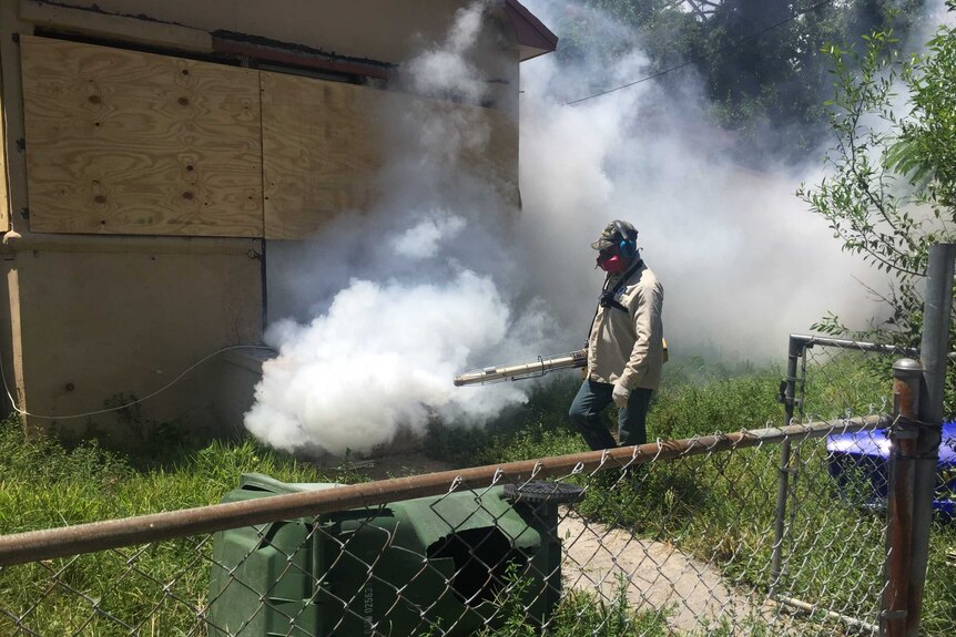 Dade County mosquito inspector Carlos Varas