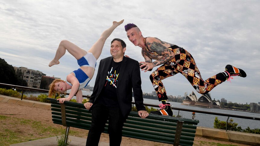 Wesley and performers at Sydney Harbour.
