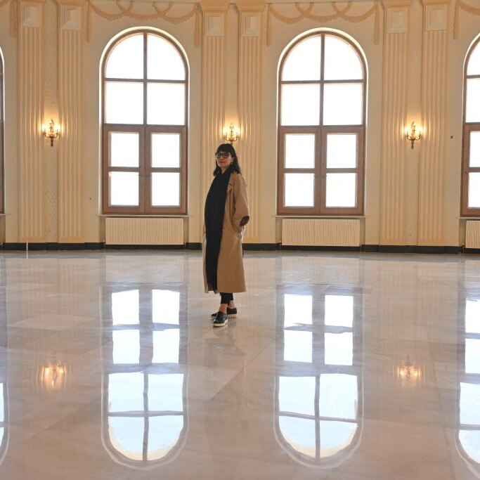 Afghanistan visual artist and photographer Rada Akbar posing for a photograph at the Darul Aman palace in Kabul.