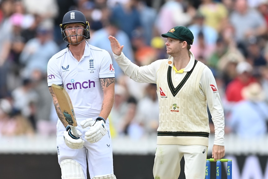 Australia fielder Steve Smith pats England batter Ben Stokes on the shoulder after a dismissal in an Ashes Test.