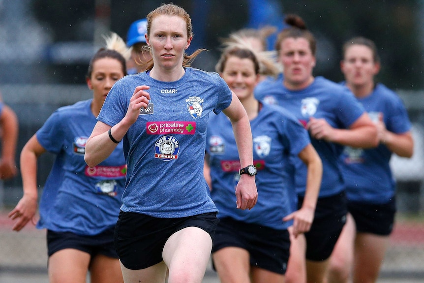 Female footballer training