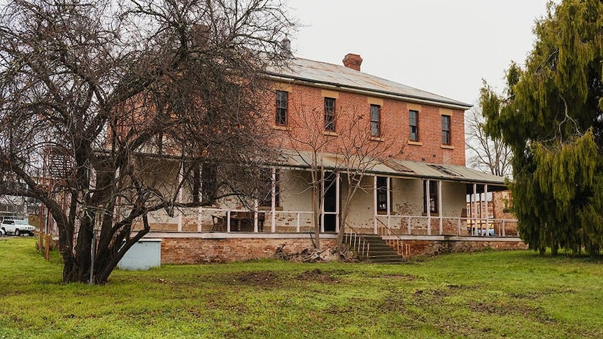 An old-style two storey brick building.