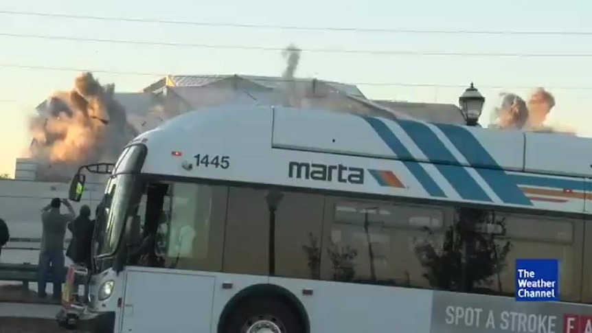 Bad timing as bus stops in front of stadium demolition live stream