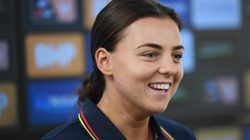 Adelaide Crows star midfielder Ebony Marinoff smiles at a press conference