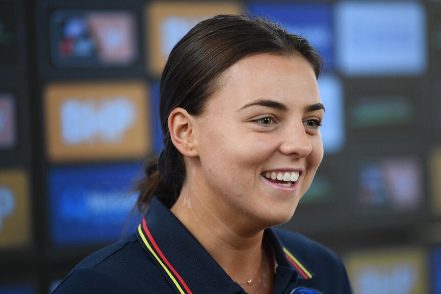Adelaide Crows star midfielder Ebony Marinoff smiles at a press conference