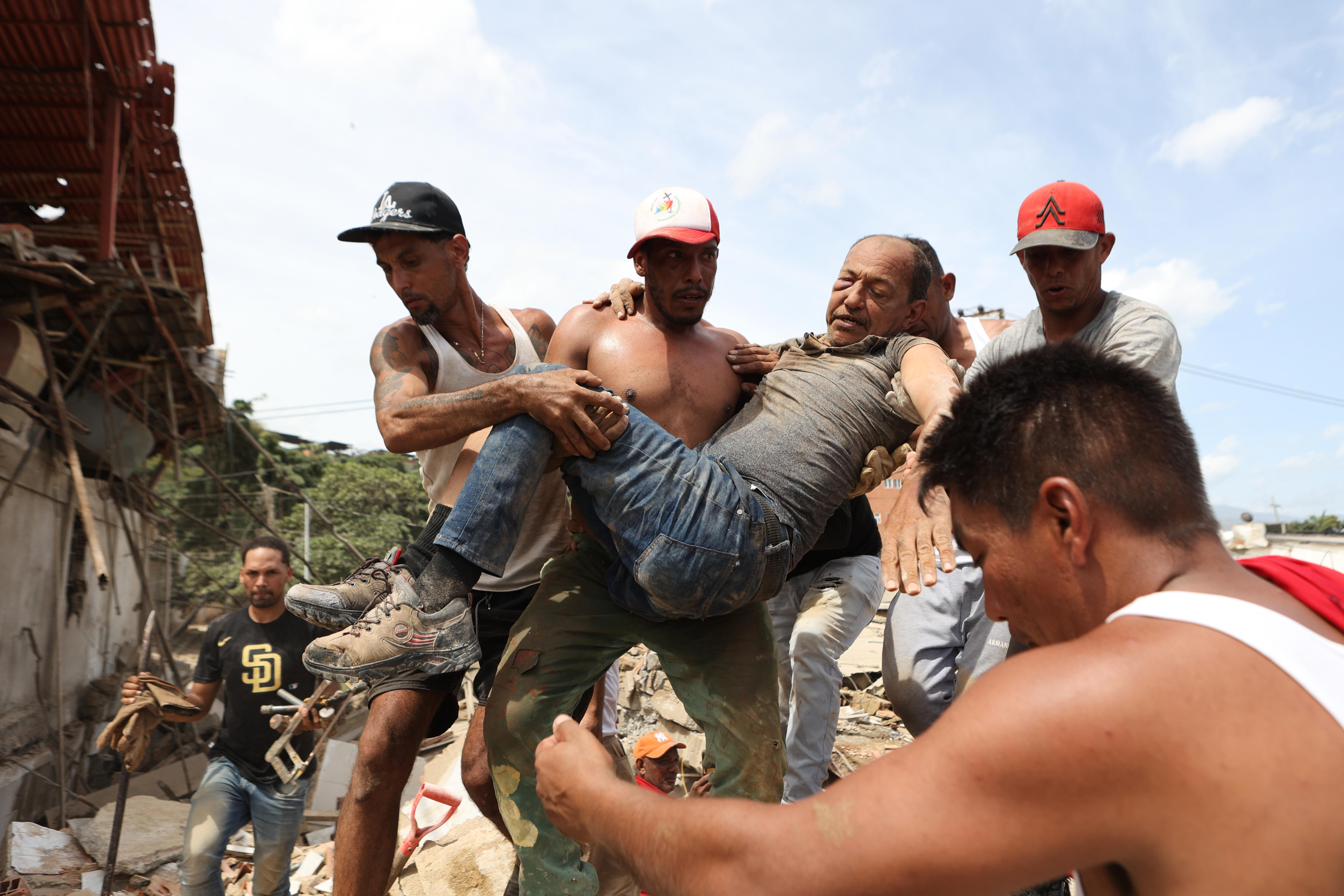 In pictures: The desperate rush to find survivors of Venezuela's twin earthquakes