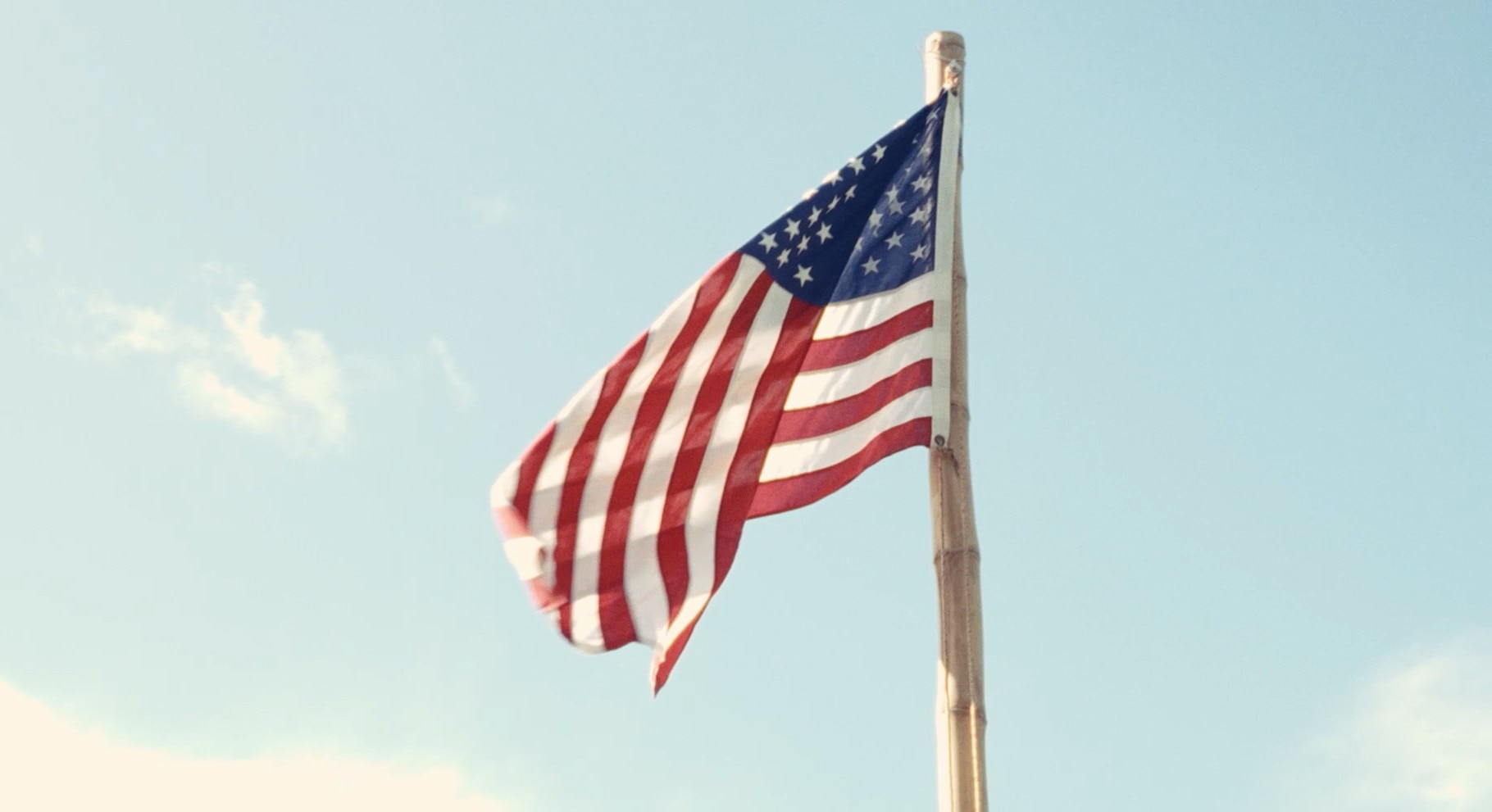 An American flag flies in the breeze.