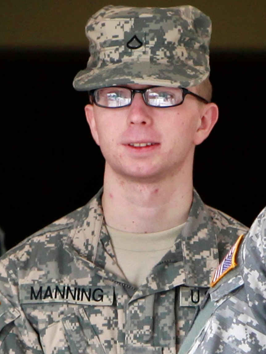 Bradley Manning is escorted from the courthouse at Fort Meade.