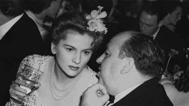 Joan Fontaine and Alfred Hitchcock at the 13th Academy Awards banquet.