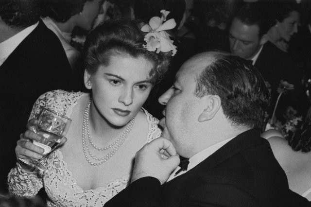 Joan Fontaine and Alfred Hitchcock at the 13th Academy Awards banquet.