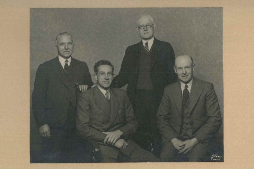 A black and white photo of the four men who pioneered the Wagga Wagga District Ambulance service