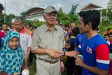 Malaysian PM visits flood victims