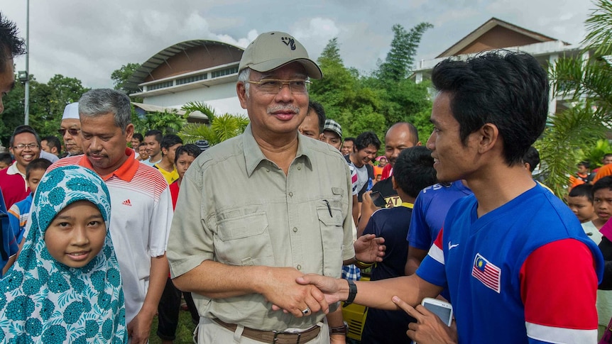 Malaysian PM visits flood victims