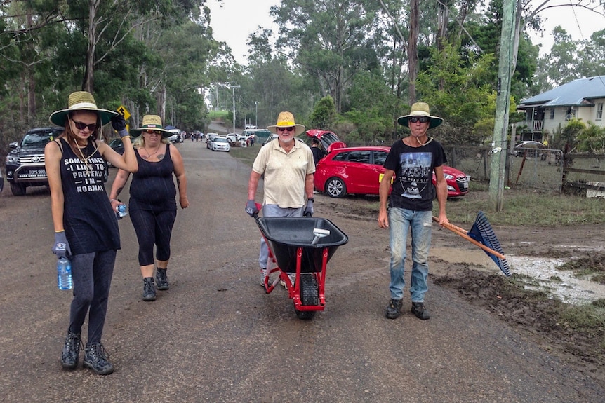 Mud Army in Beenleigh head out to help their neighbours.