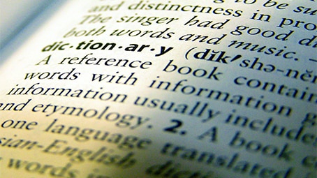 Close up on the definition of dictionary in the dictionary