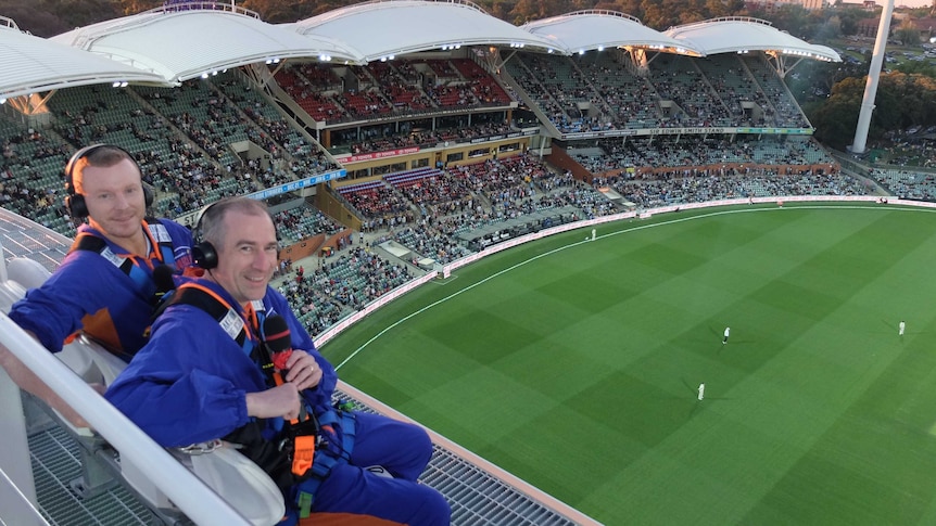 Gerard Whateley and Chris Rogers sit atop Adelaide Oval