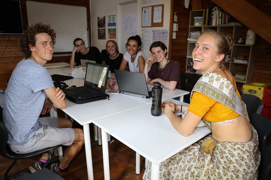 Hare Krishna students sitting in classroom