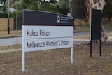 A sign beside a road outside Hakea Prison and Melaleuca Women's Prison.