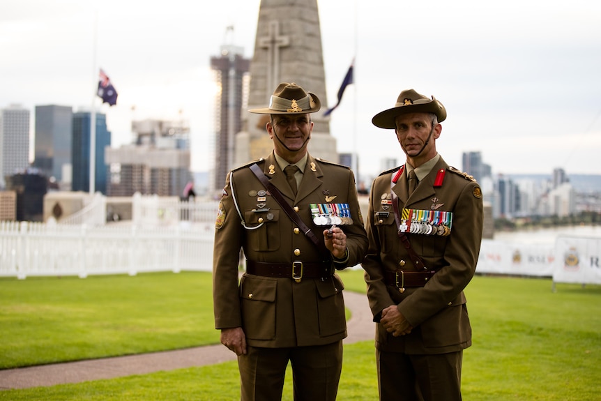 Two army representatives pictured in front of the State War Memorial in Kings Park