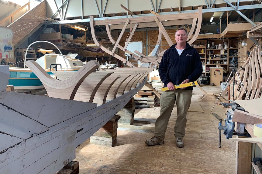 Tasmanian boatbuilder Andrew Denman in his workshop.