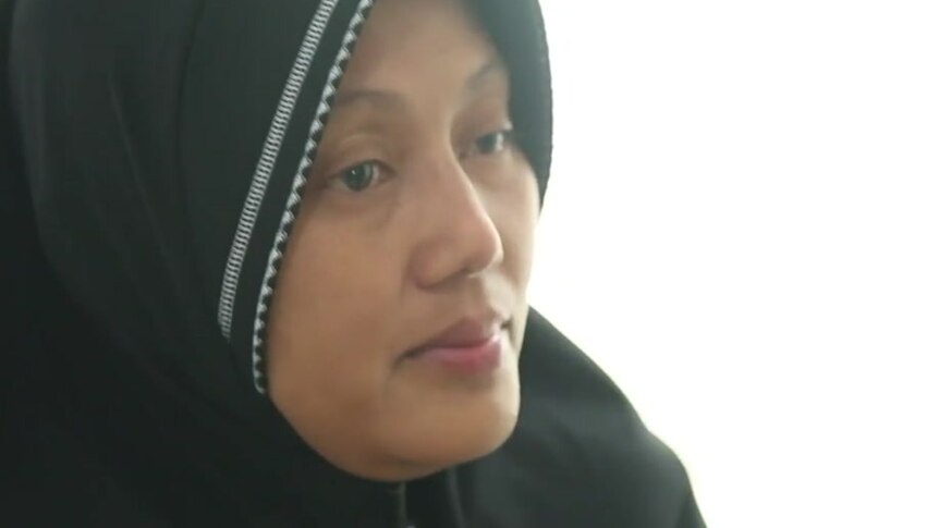 A close photo of an Indonesian woman's face.