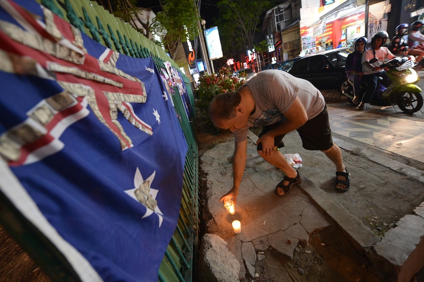 Candles have been lit near where the Sari Club once stood.