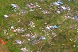 Aerial shot of properties damaged in Port Vila after Cyclone Pam