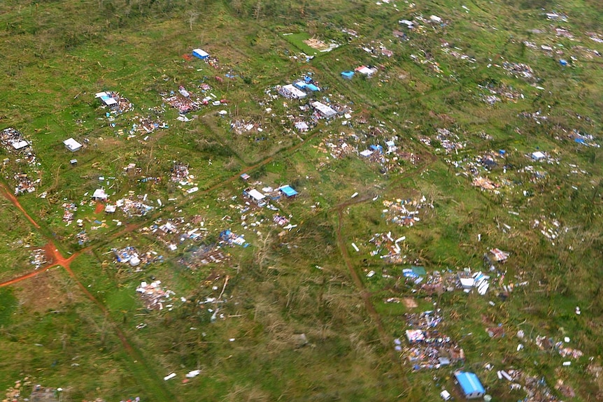 Aerial shot of properties damaged in Port Vila after Cyclone Pam