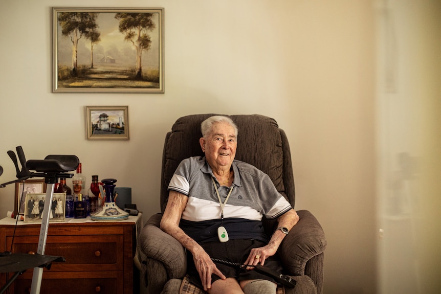 Neville Lorensen sits in his aged care facility in Gympie