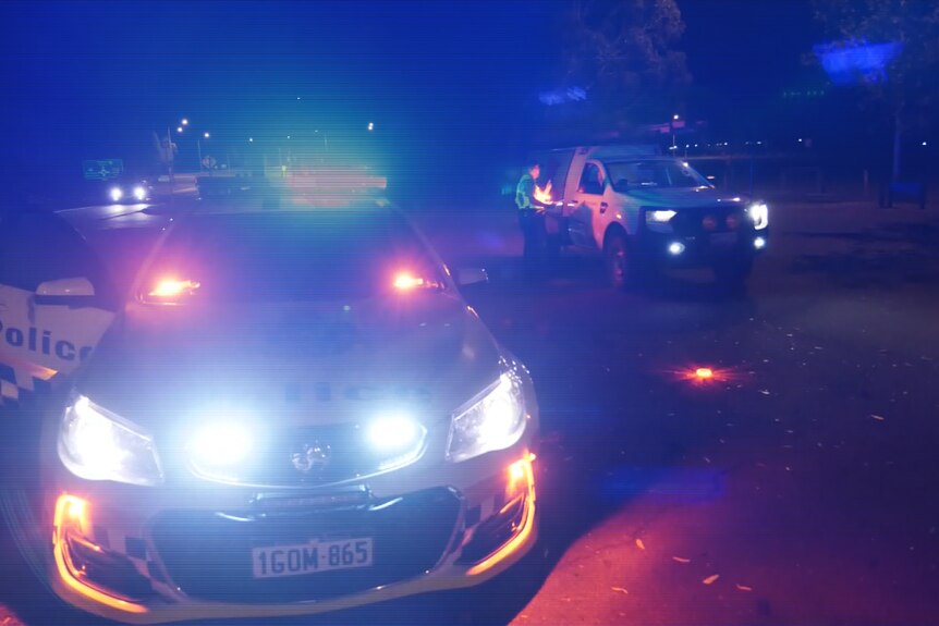 Police checkpoint at night